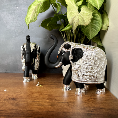 Pure gold and silver coated elephant idol with trunk up